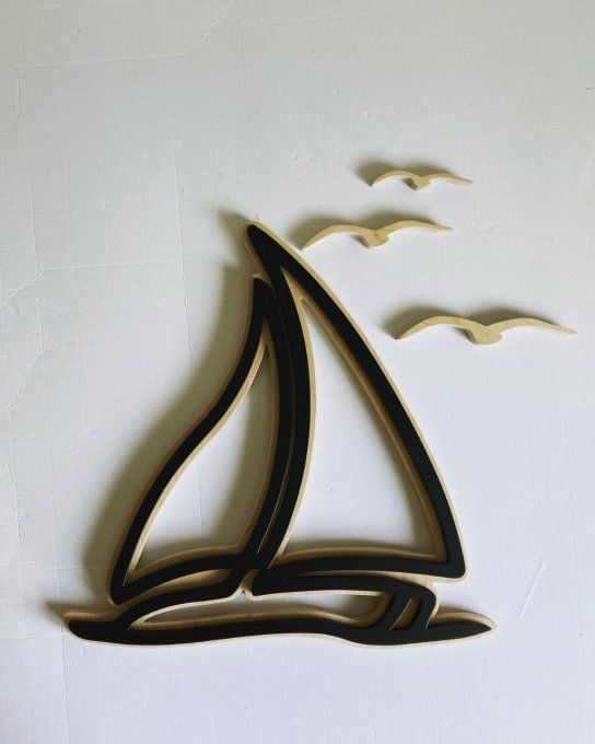 réservé: Lot serre-livres et catamaran.